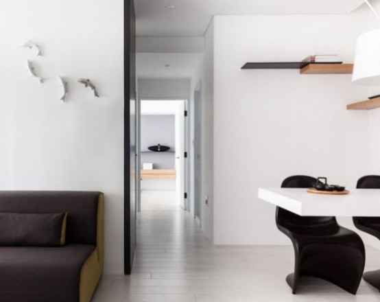 Minimalist Black And White Apartment With Colorful Touches