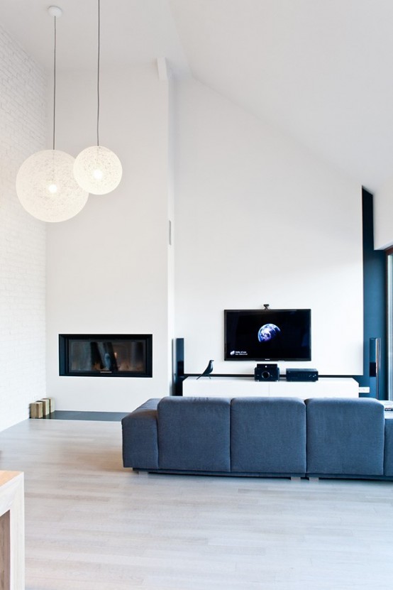 Minimalist Black And White House With Oak Floors And Furniture