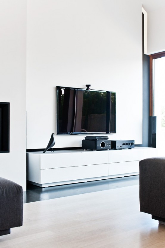 Minimalist Black And White House With Oak Floors And Furniture