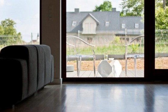 Minimalist Black And White House With Oak Floors And Furniture