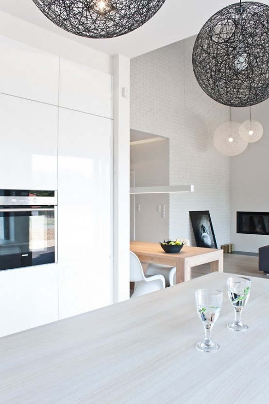 Minimalist Black And White House With Oak Floors And Furniture