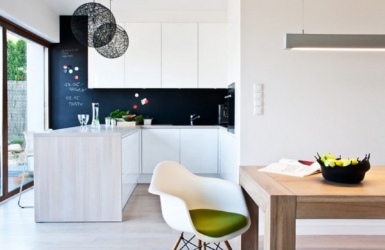 Minimalist Black And White House With Oak Floors And Furniture