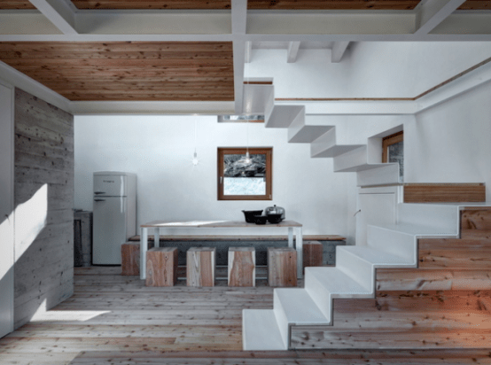 Minimalist Cabin Covered With Stone From Ruins