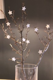 branches with white stars are an amazing Christmas decoration with a minimal feel