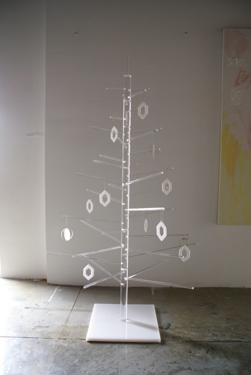 an acrylic Christmas tree with matching acrylic ornaments for a minimalist touch
