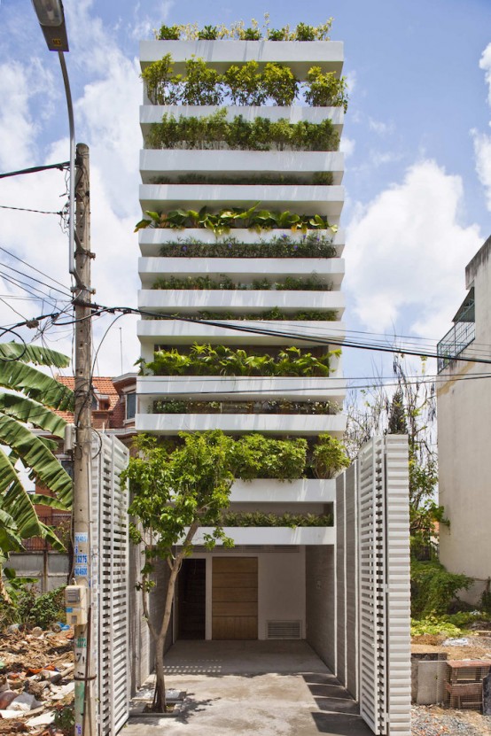 Minimalist Concrete House With A Large Vertical Garden