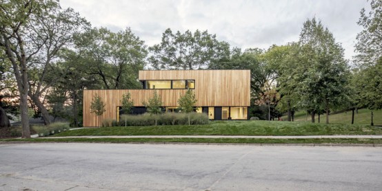 Minimalist Home With Oak-Surfaced Interiors On A Tricky Site