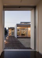 Minimalist House Design That Consist Of Small Rectangular Blocks