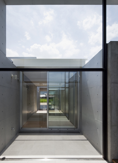 Minimalist House Design That Consist Of Small Rectangular Blocks