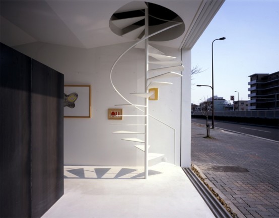 This curved spiral staircase is great example of how minimalist they could be. They are located at House in Nagoya 01 designed Suppose Design Office.