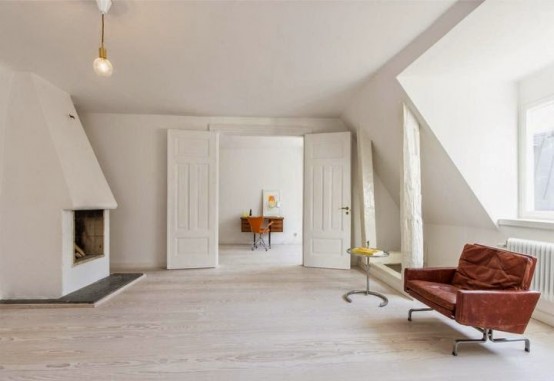 Minimalist Stockholm Apartment With Bright Orange Accents