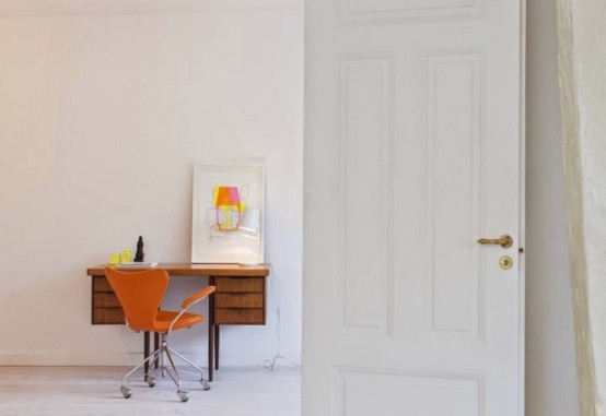 Minimalist Stockholm Apartment With Bright Orange Accents