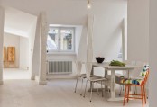 Minimalist Stockholm Apartment With Bright Orange Accents