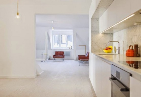 Minimalist Stockholm Apartment With Bright Orange Accents