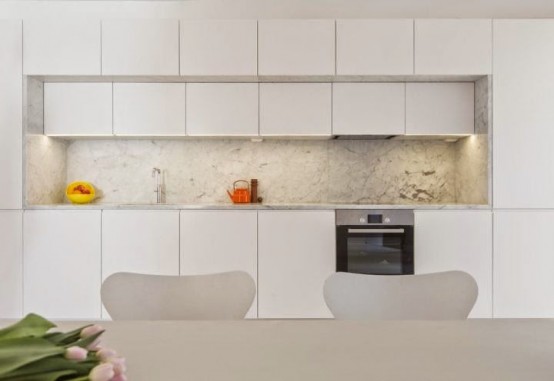 Minimalist Stockholm Apartment With Bright Orange Accents