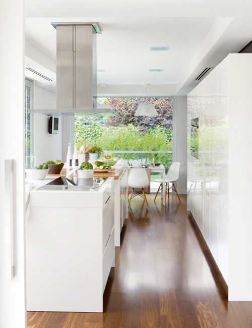 Minimalist White Kitchen With A Summer Feel