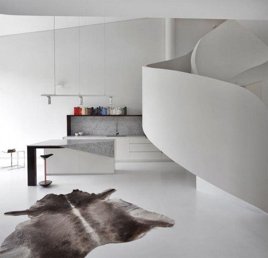 Minimalist White Loft Design With Sculptural Accents