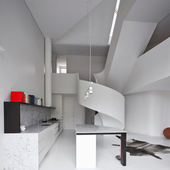 Minimalist White Loft Design With Sculptural Accents