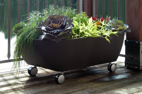 mobile bathtub-like planter to organize a mobile garden