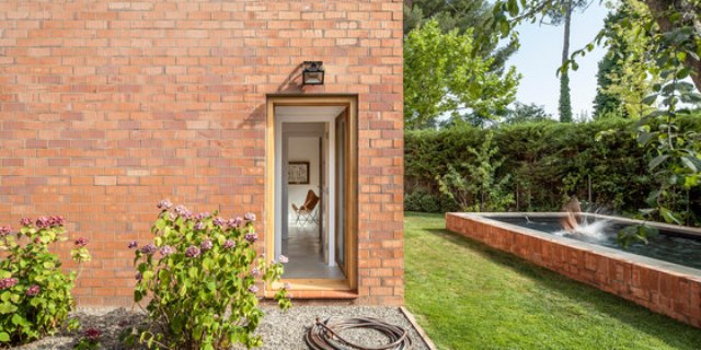 Modern Brick Home That Merges With The Garden