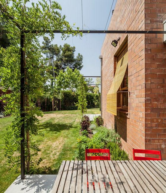 Modern Brick Home That Merges With The Garden