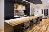 a good-looking black kitchen with an island