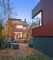Modern Annex Home With Lots Of Wood In Decor