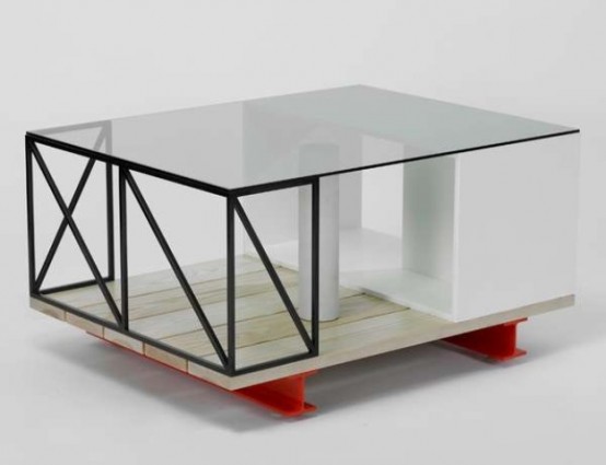 a modern industrial coffee table on red legs, with a glass tabletop, a black metal frame is a lovely idea for industrial spaces