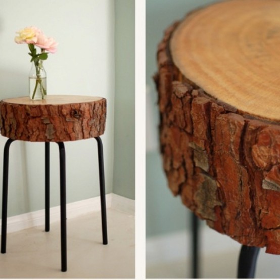 a cool rustic coffee table of a wood slice on metal legs is a lovely idea for a rustic or famrhouse space and it can be DIYed