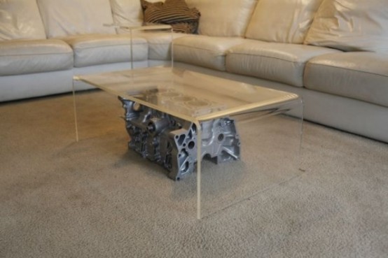 a unique coffee table of a large metal piece covered with an acrylic one is a lovely idea of a furniture item, it will make your space cooler
