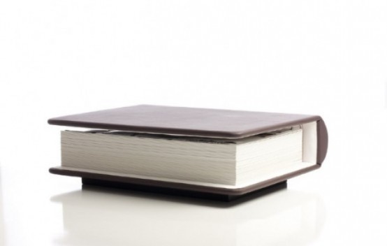 a book-shaped coffee table is a lovely idea for a book-lover home, it can make your space very stylish