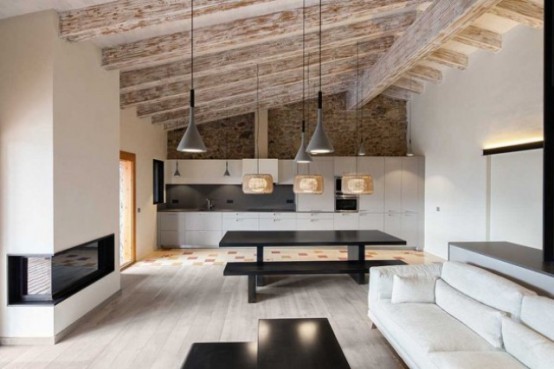 Modern Home With Stone Walls And Wooden Beams