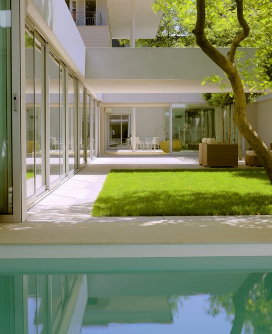 Modern Low House With Zen Garden And Green Roof