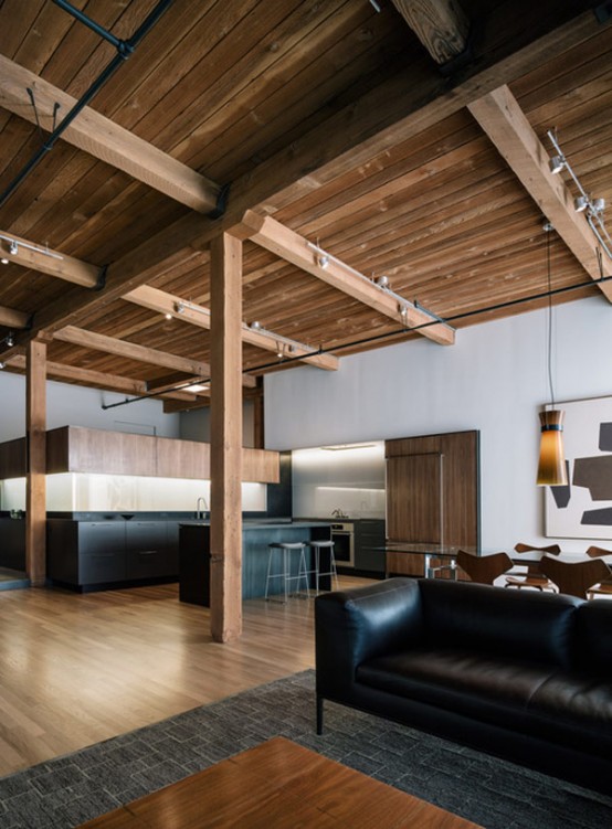 Modern Loft  Renovation With Lots Of Wood  In The Decor 