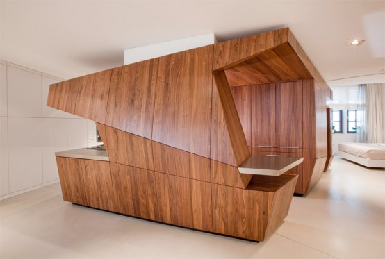 Modern Loft With A Freestanding Centralized Wood Veneer Kitchen