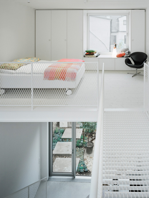Modern Minimalist Townhouse Between Very Old Neighboring