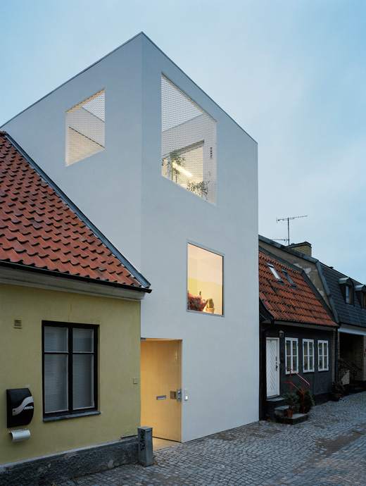 Modern Minimalist Townhouse Between Very Old Neighboring