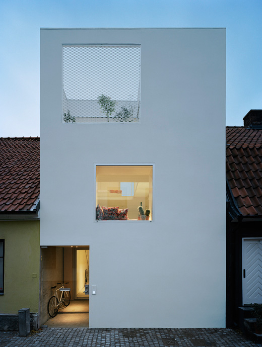 Modern Minimalist Townhouse Between Very Old Neighboring
