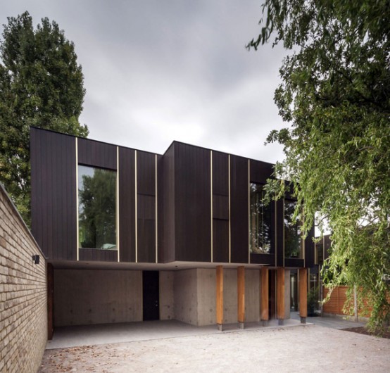 Modern Pear Tree House With Wood And Concrete In Decor