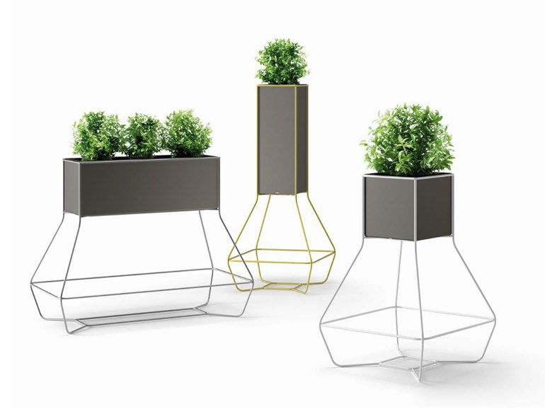 grey square planters on catchy stands and with greenery are a nice idea to highlight your outdoor space