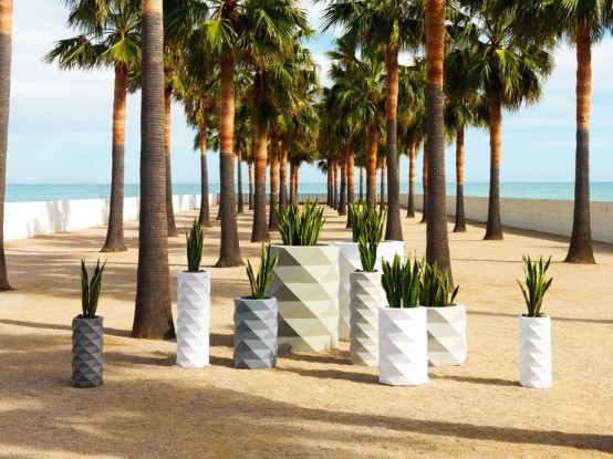 white, grey and ivory faceted planters of various sizes will create a bold and chic decor combo for your outdoor space