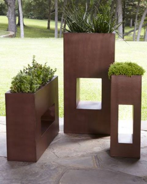 rectangular copper planters with cavities at various heights look modern, stylish and very statement like