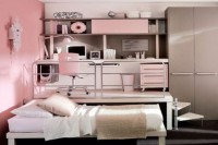 a girlish light pink teen girl bedroom with grey touches to calm down the space is very chic and girlish