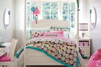 a cool teen girl bedroom in neutrals and in traditional style spruced up with turquoise and pink touches and some prints