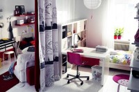 a bright teen girl bedroom – a neutral base spruced up with bright pink, red and black touches and a space divider for sharing the room