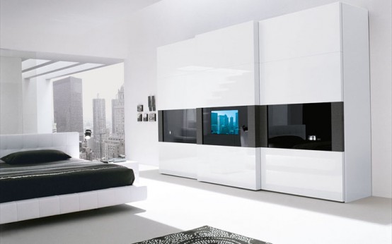 Super Modern Bedroom Wardrobe With A TV Built In The Door - DigsDigs