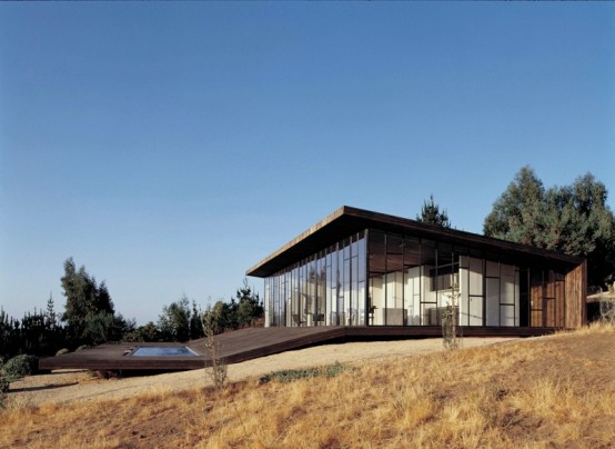 Modern Wooden House Designed Around a Deck