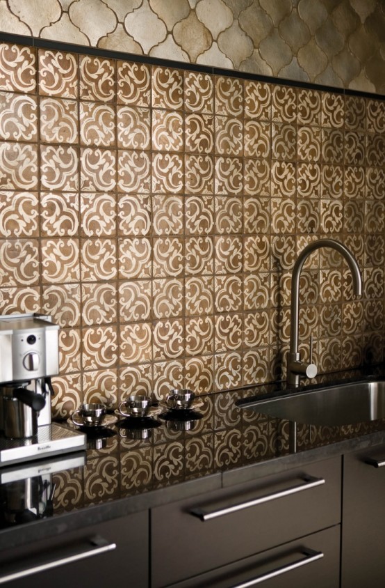 a chic and elegant kitchen with black cabinets, a chic Moroccan tile backsplash and gold tiles is a lovely idea with a chic color combo and a bit of pattern