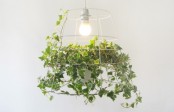 a grid lampshade with greenery is a gorgeous idea for any space, it will refresh your nook and will make it more modern and bold