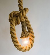 rope and a bulb as a creative, wabi-sabi style, pendant lamp, it looks catchy, bold and unusual, great for industrial spaces, too